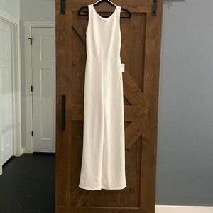 NWT white polyester jumpsuit.